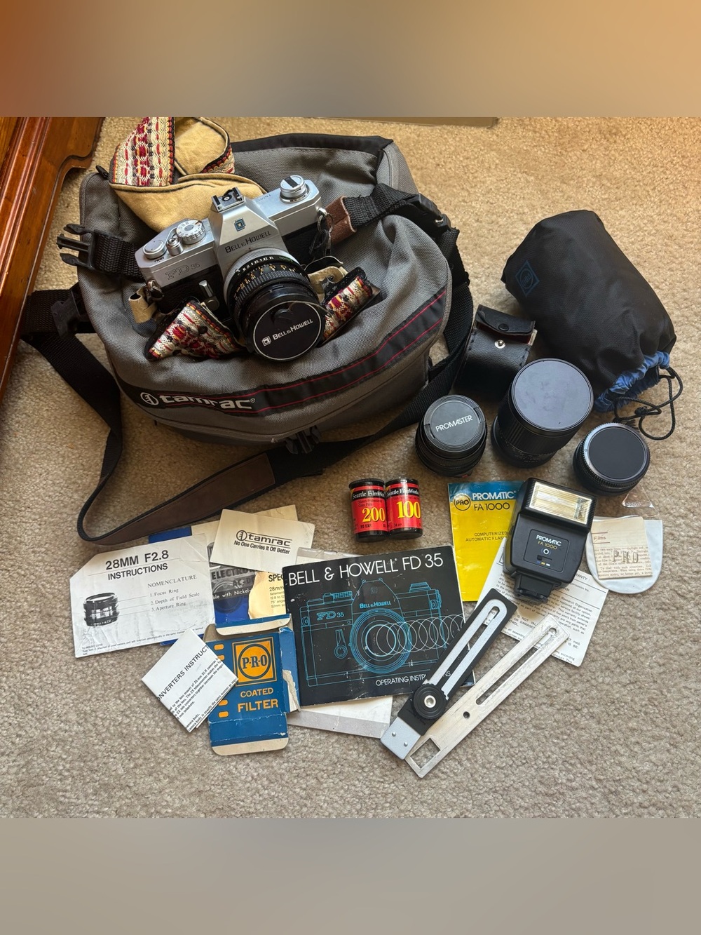 Untested Bell and Howell Film Camera Lot - bag, camera, lenses, film, flash